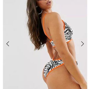ASOS DESIGN recycled contrast knot high leg hipster bikini in zebra